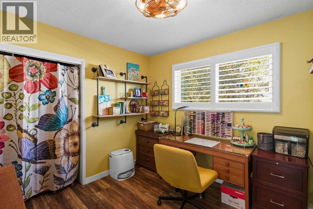 Single Family House Bi-level for Sale in  Brazeau Crescent SW Braeside Calgary 