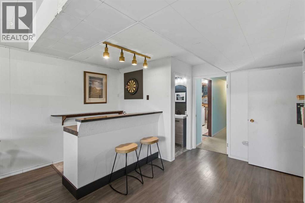 Single Family House Bi-level for Sale in  Brazeau Crescent SW Braeside Calgary 