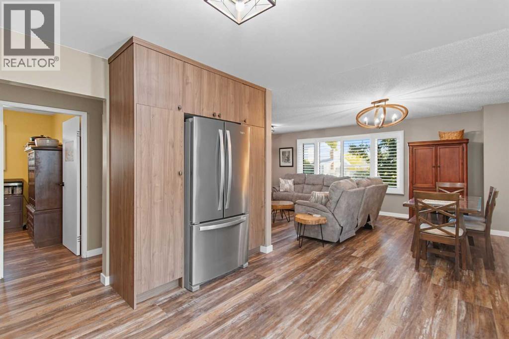 Single Family House Bi-level for Sale in  Brazeau Crescent SW Braeside Calgary 