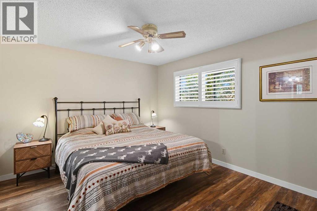 Single Family House Bi-level for Sale in  Brazeau Crescent SW Braeside Calgary 