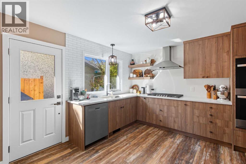 Single Family House Bi-level for Sale in  Brazeau Crescent SW Braeside Calgary 