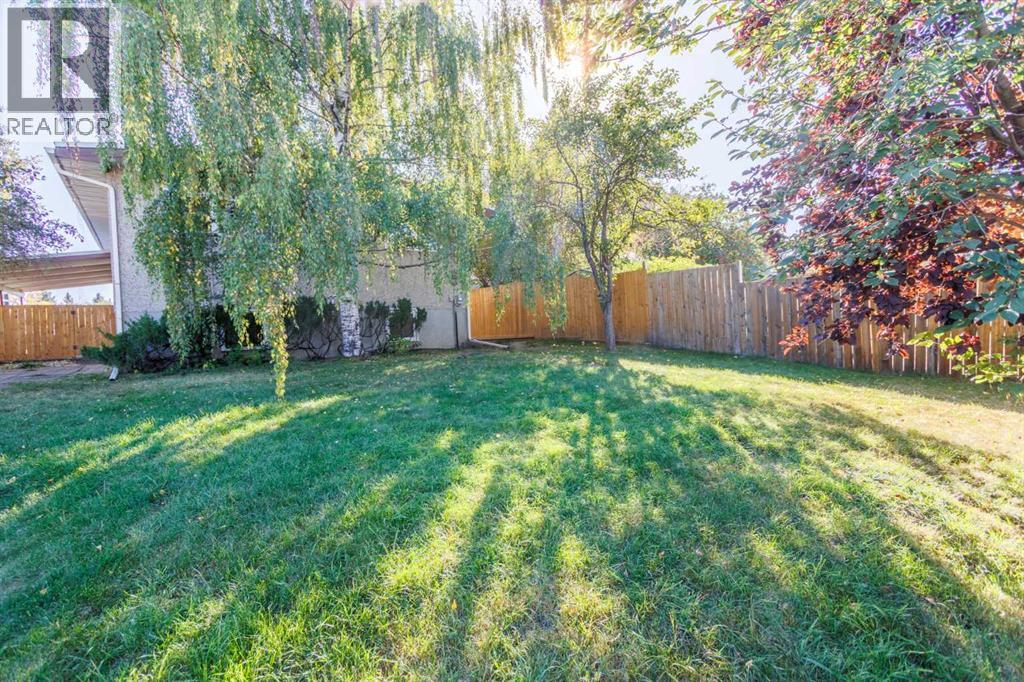 Single Family House Bi-level for Sale in  Brazeau Crescent SW Braeside Calgary 