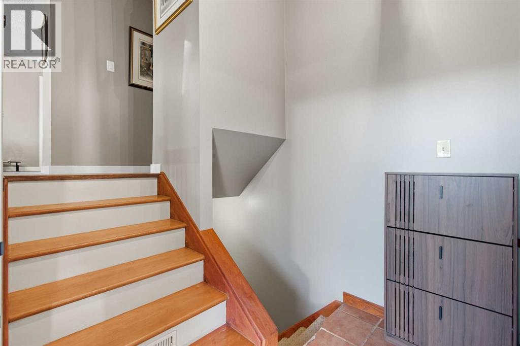 Single Family House Bi-level for Sale in  Brazeau Crescent SW Braeside Calgary 