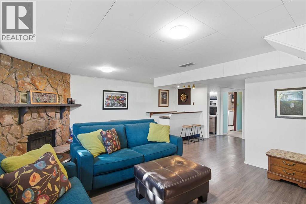 Single Family House Bi-level for Sale in  Brazeau Crescent SW Braeside Calgary 