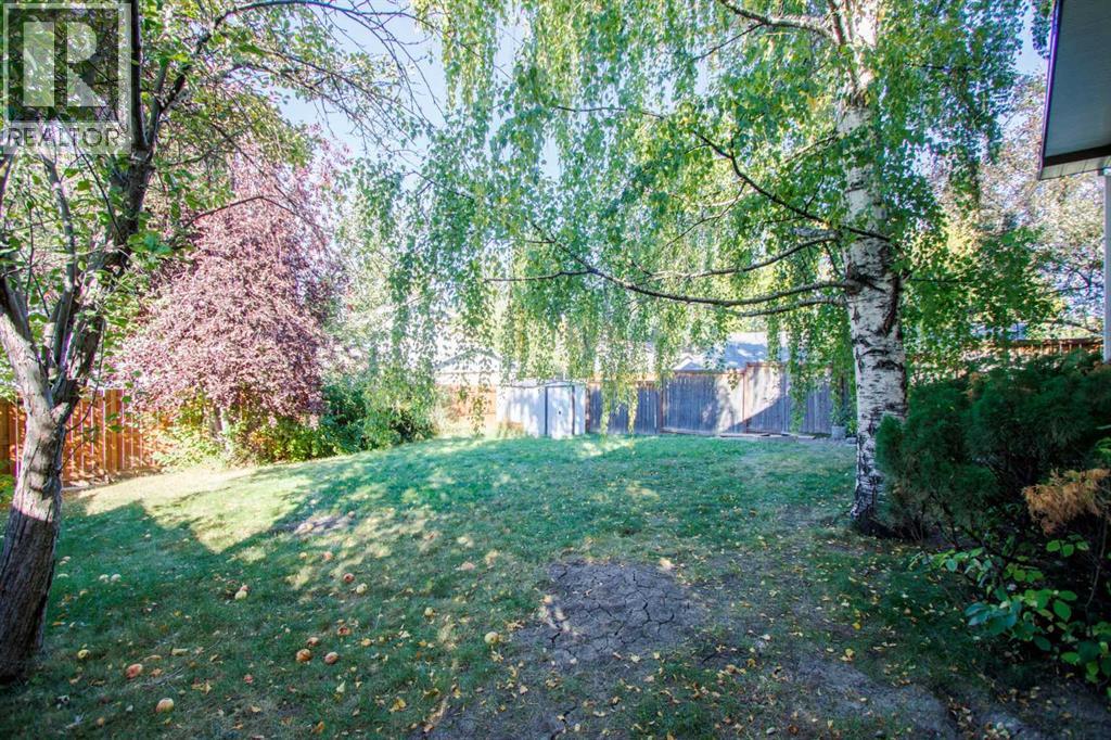 Single Family House Bi-level for Sale in  Brazeau Crescent SW Braeside Calgary 