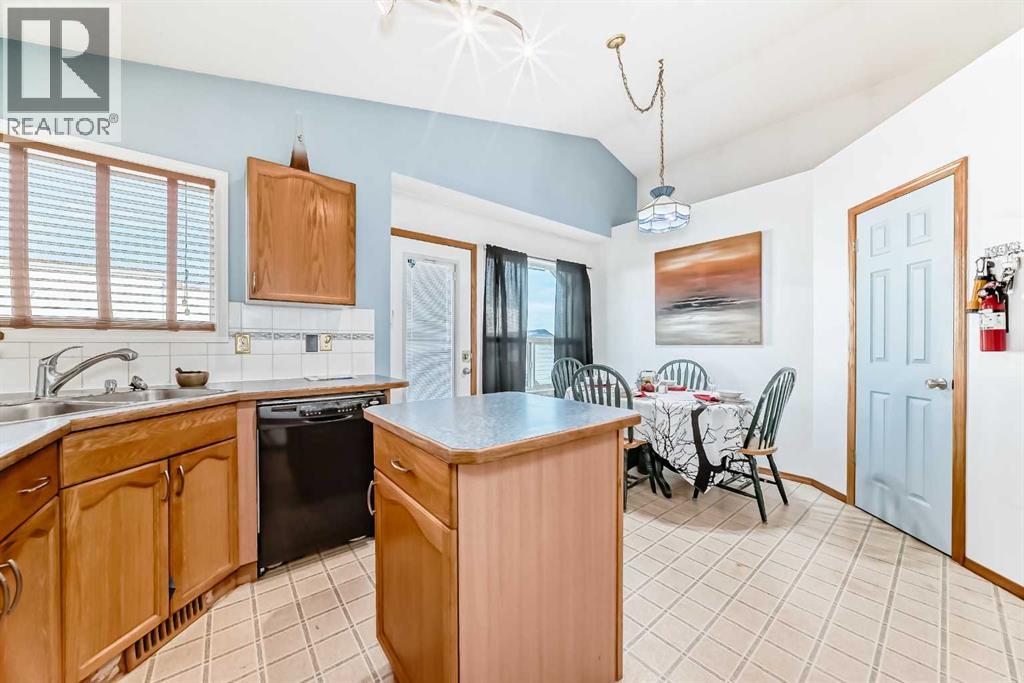 Single Family House Bi-level for Sale in  ERIN MEADOW Way SE Erin Woods Calgary 