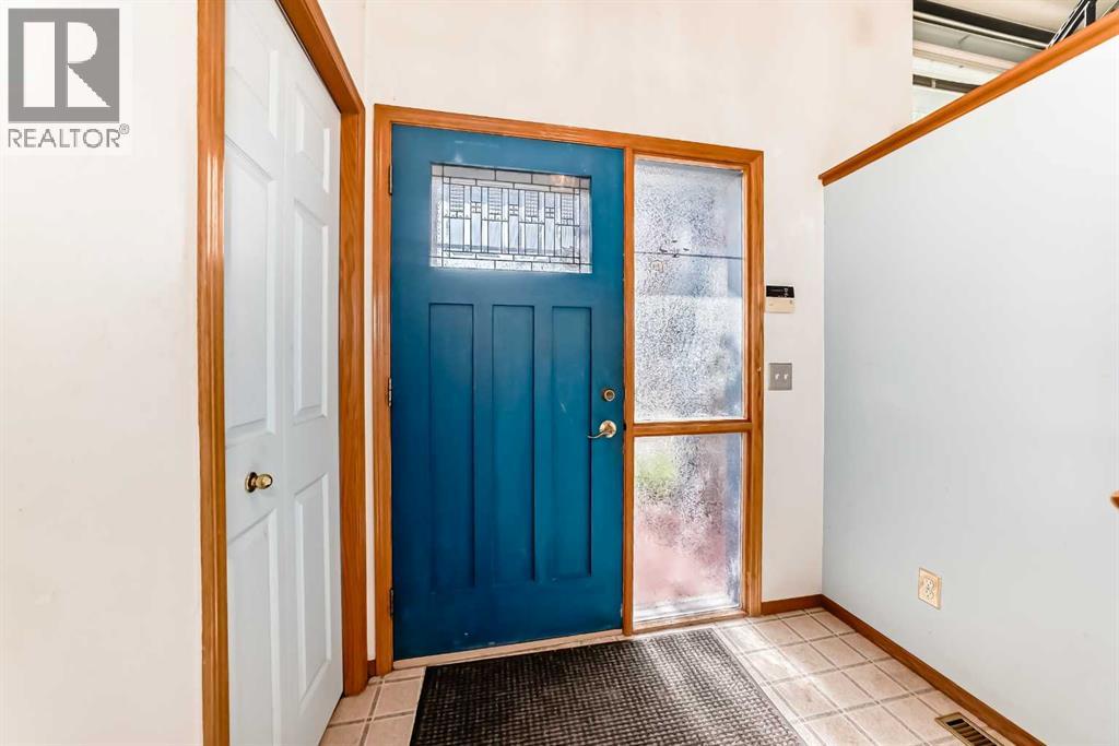 Single Family House Bi-level for Sale in  ERIN MEADOW Way SE Erin Woods Calgary 