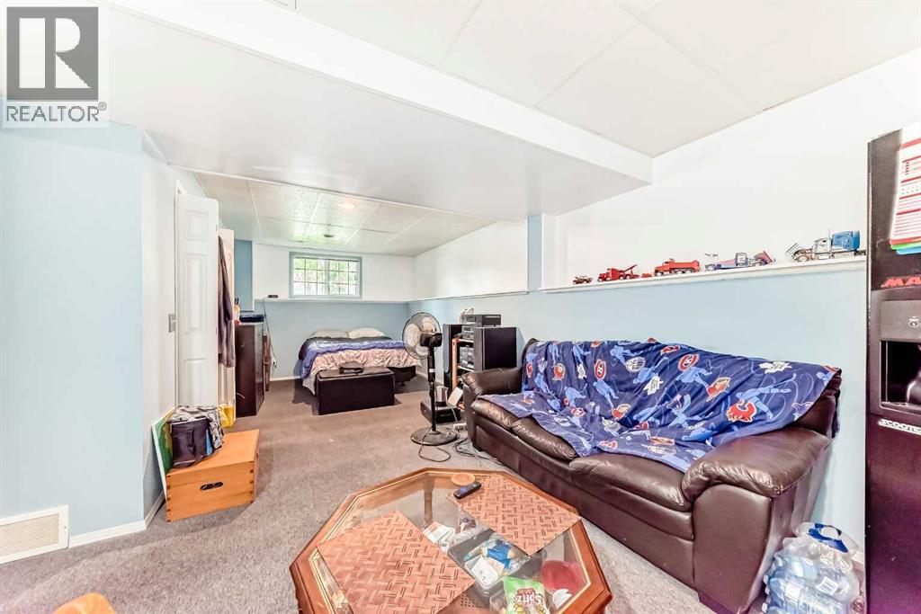 Single Family House Bi-level for Sale in  ERIN MEADOW Way SE Erin Woods Calgary 