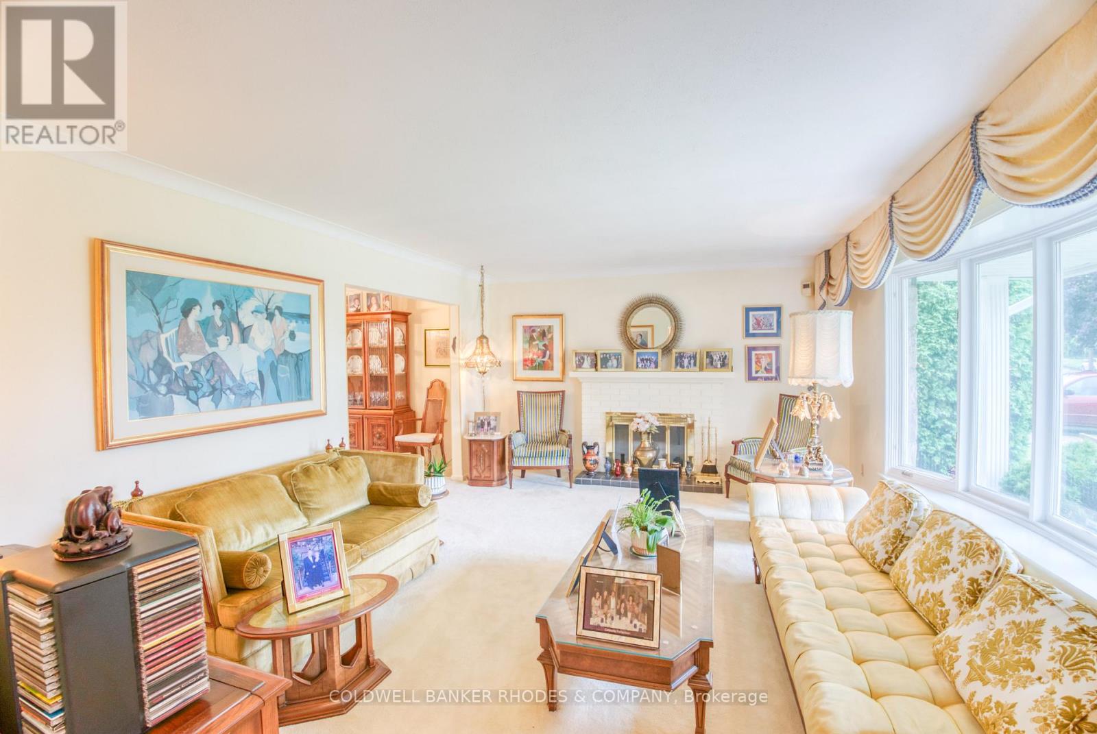 Living room has hardwood under the carpet