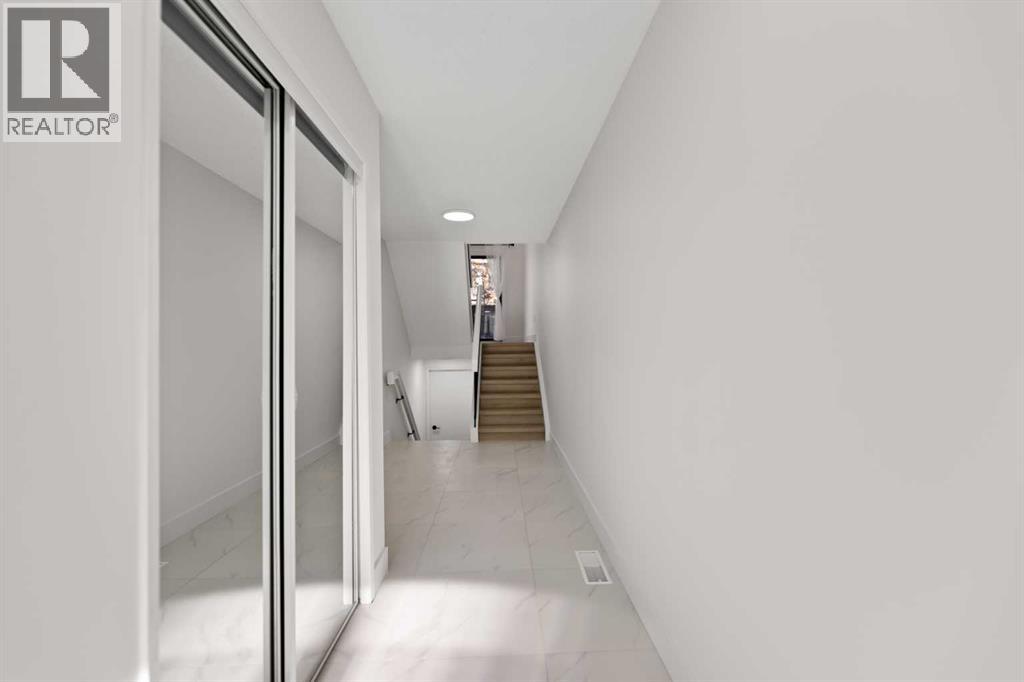 Single Family House 4 Level for Sale in  Glamis Gardens SW Glamorgan Calgary 