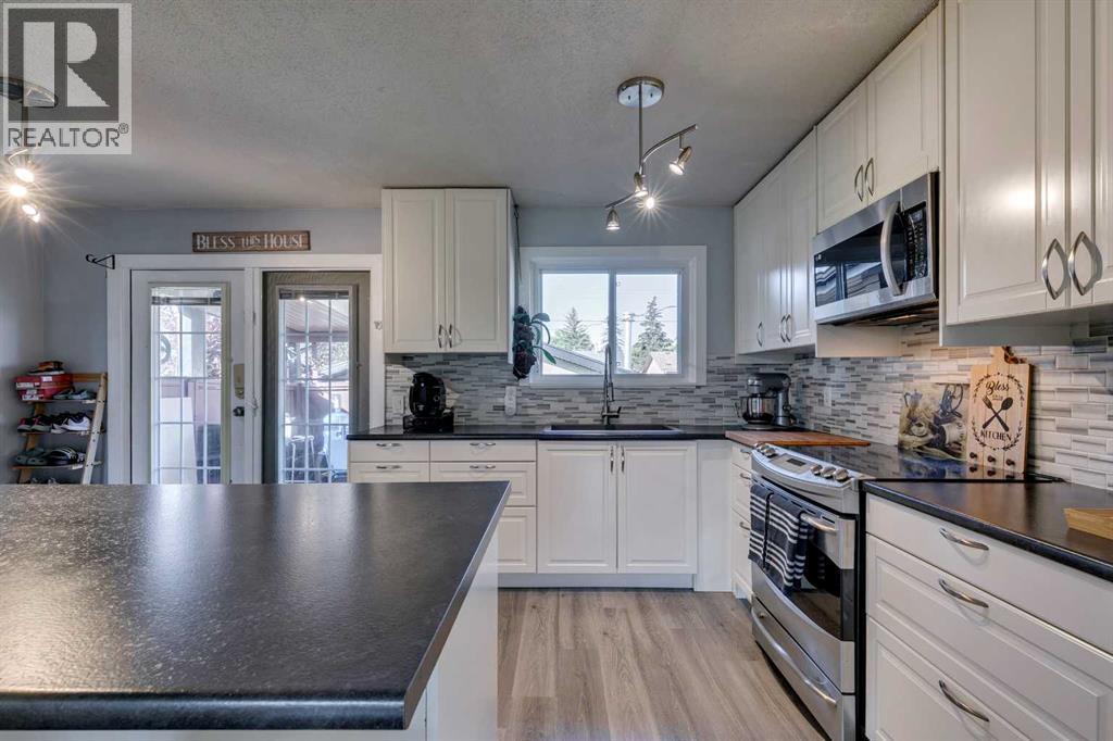 Single Family House Bi-level for Sale in  Malvern Close NE Marlborough Park Calgary 