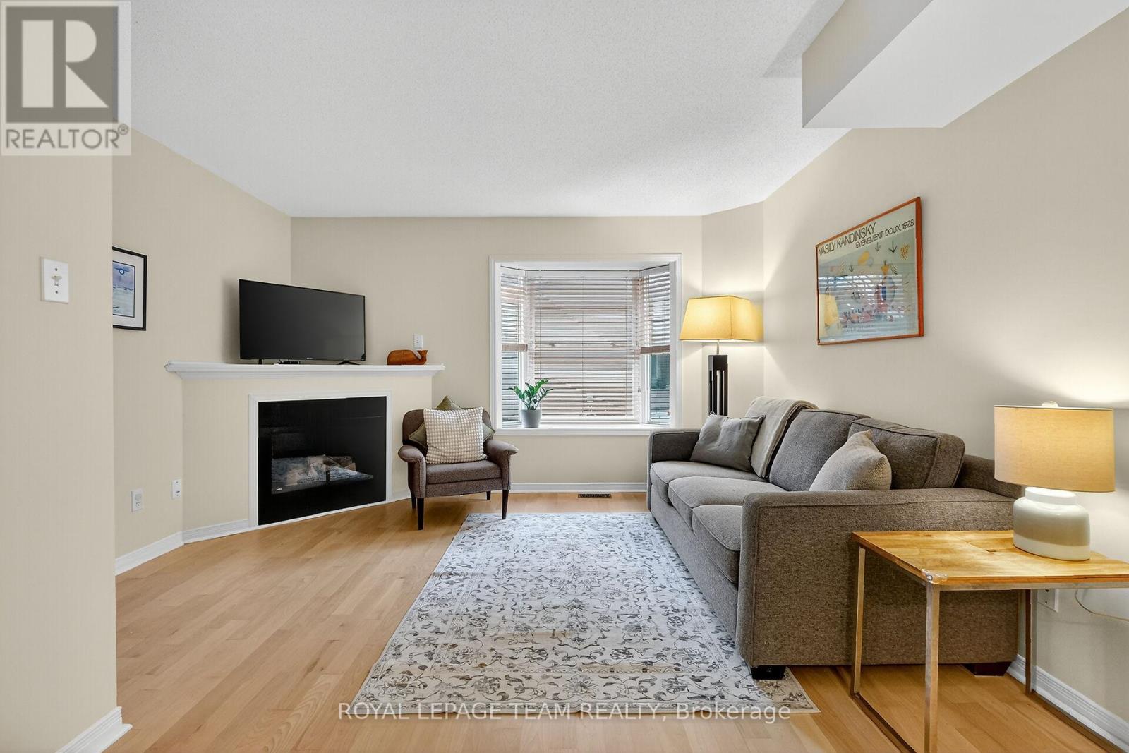 Living room, with sunny south-facing bay window