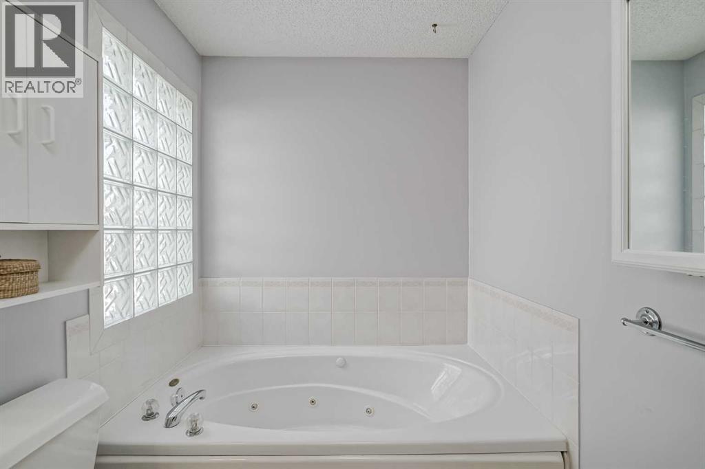 Single Family House Bungalow for Sale in  Evergreen Street SW Evergreen Calgary 