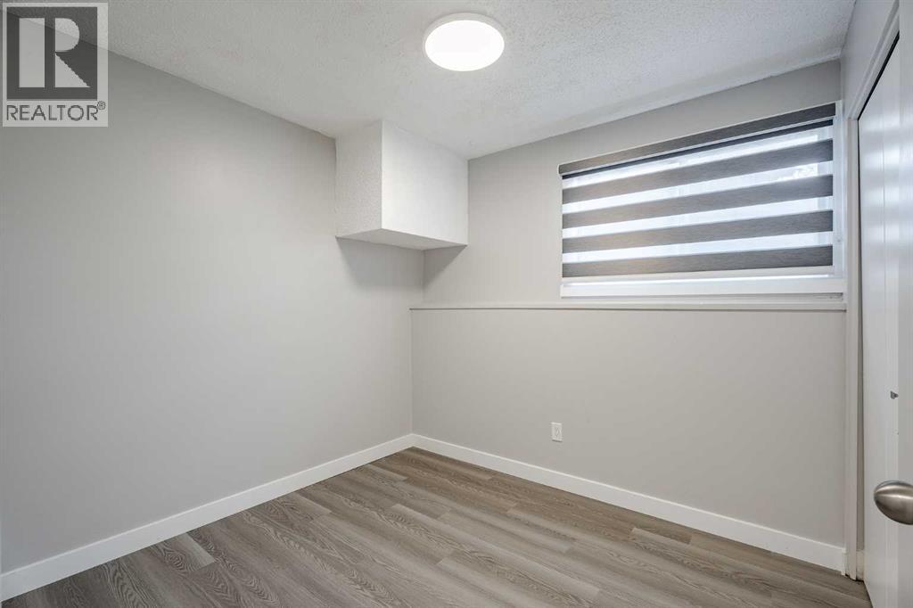 Multi-family House Bi-level for Sale in  Sabrina Road SW Southwood Calgary 