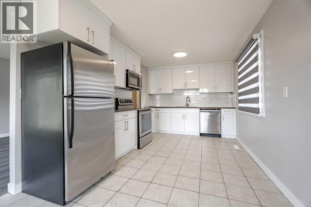 Multi-family House Bi-level for Sale in  Sabrina Road SW Southwood Calgary 