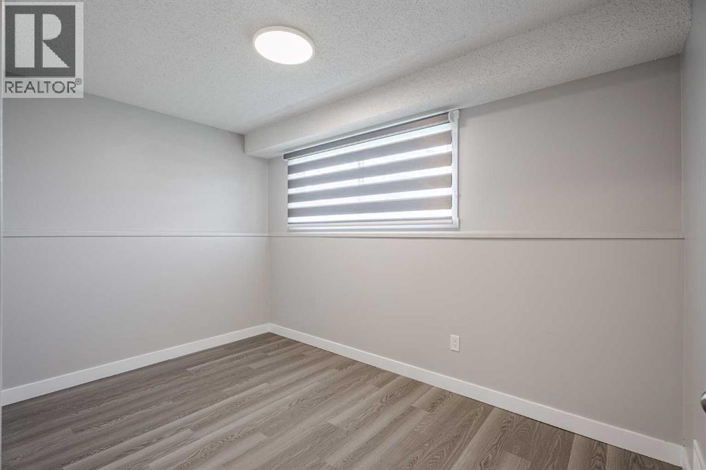 Multi-family House Bi-level for Sale in  Sabrina Road SW Southwood Calgary 