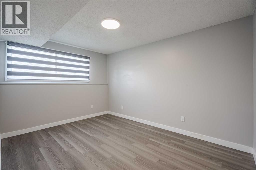 Multi-family House Bi-level for Sale in  Sabrina Road SW Southwood Calgary 