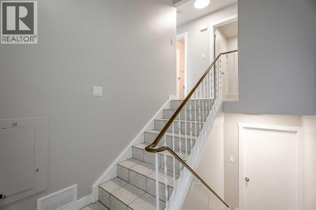 Multi-family House Bi-level for Sale in  Sabrina Road SW Southwood Calgary 