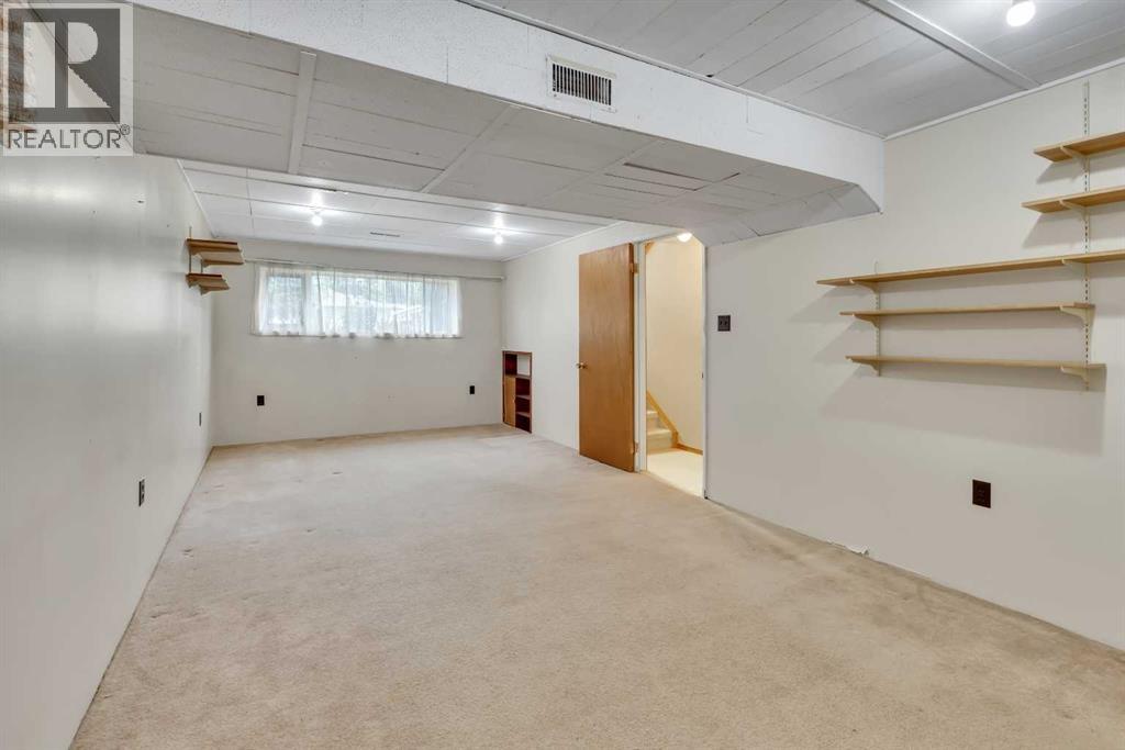 Single Family House Bi-level for Sale in  Boulton Road NW Brentwood Calgary 