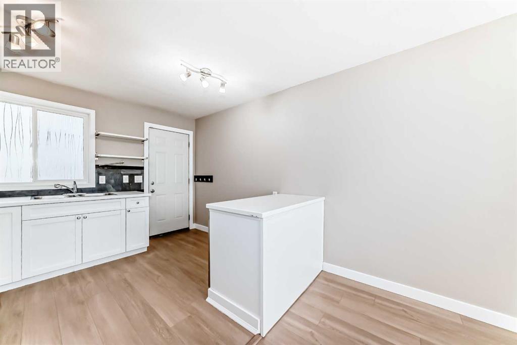 Single Family House Bi-level for Sale in  A Street SE Penbrooke Meadows Calgary 