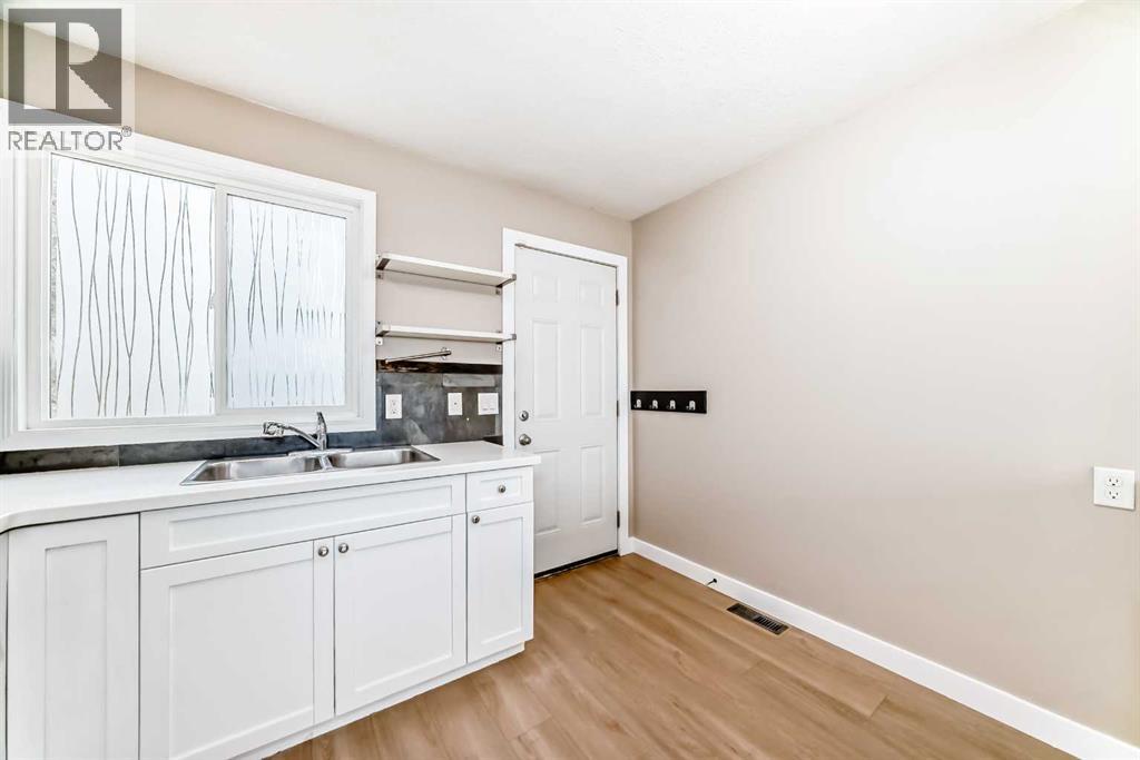 Single Family House Bi-level for Sale in  A Street SE Penbrooke Meadows Calgary 