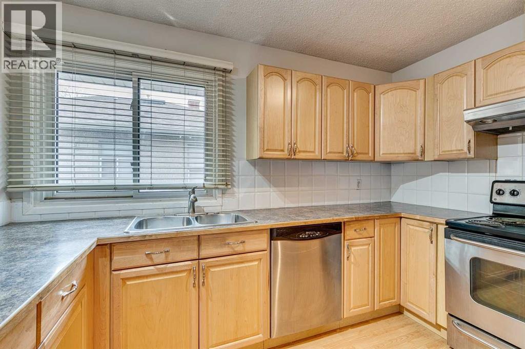 Multi-family House Bungalow for Sale in  &   Avenue NW Mount Pleasant Calgary 