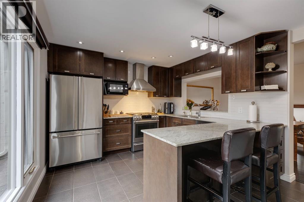 Single Family House 4 Level for Sale in  Point Mckay Road NW Point McKay Calgary 