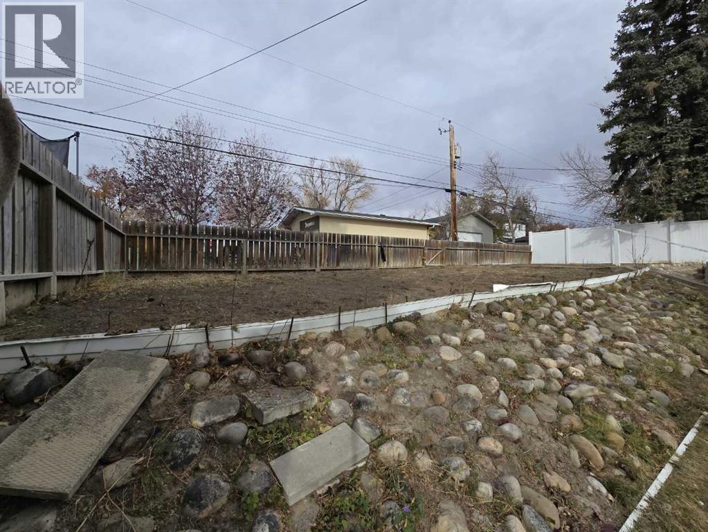 Single Family House Bungalow for Sale in  Holly Street NW Highwood Calgary 