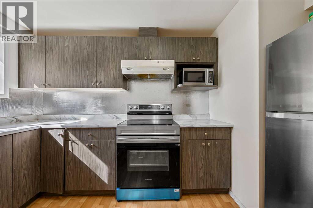 Single Family House Bi-level for Sale in   Avenue NE Pineridge Calgary 