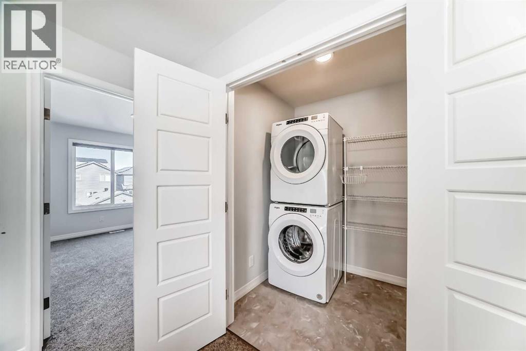 Single Family House for Sale in  Belmont Boulevard SW Belmont Calgary 