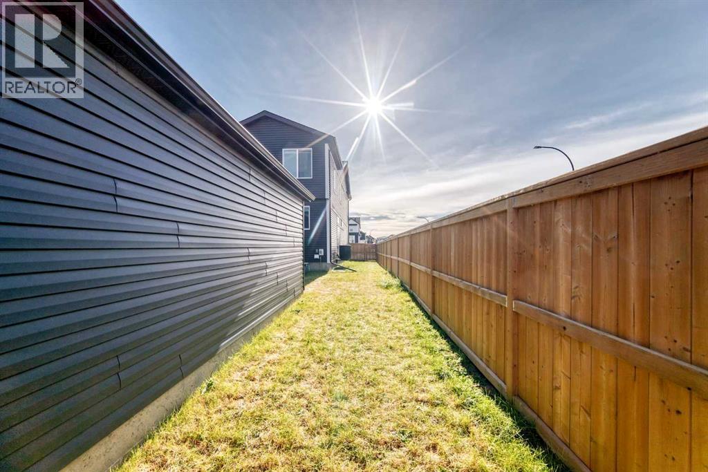 Single Family House for Sale in  Belmont Boulevard SW Belmont Calgary 