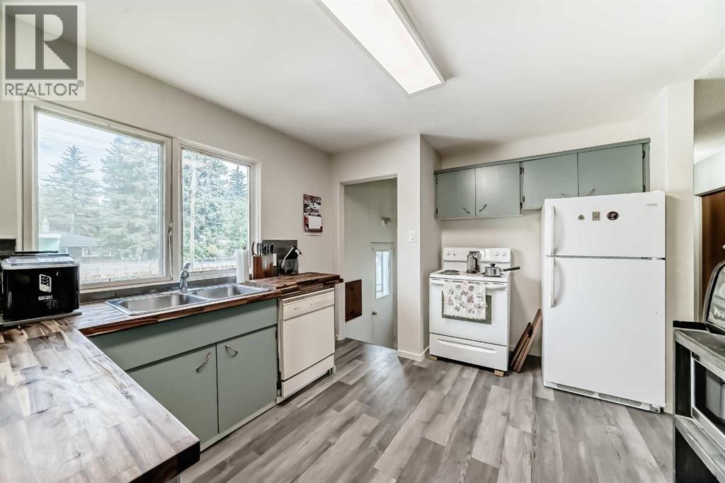 Single Family House Bungalow for Sale in  Springwood Drive SW Southwood Calgary 