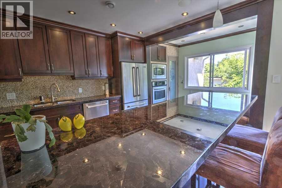 Single Family House Bungalow for Sale in  Scotland Street SW Scarboro Calgary 