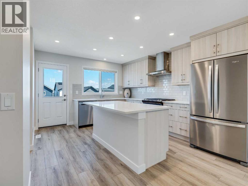 Single Family House 5 Level for Sale in  Aquila Way NW Glacier Ridge Calgary 