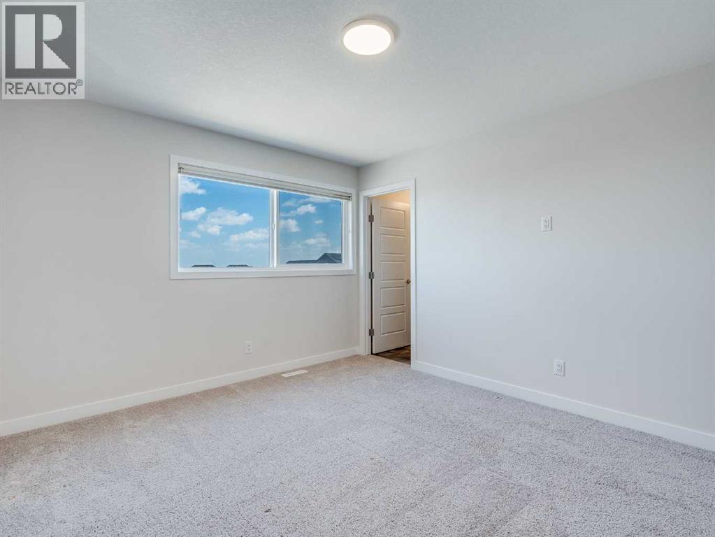 Single Family House 5 Level for Sale in  Aquila Way NW Glacier Ridge Calgary 