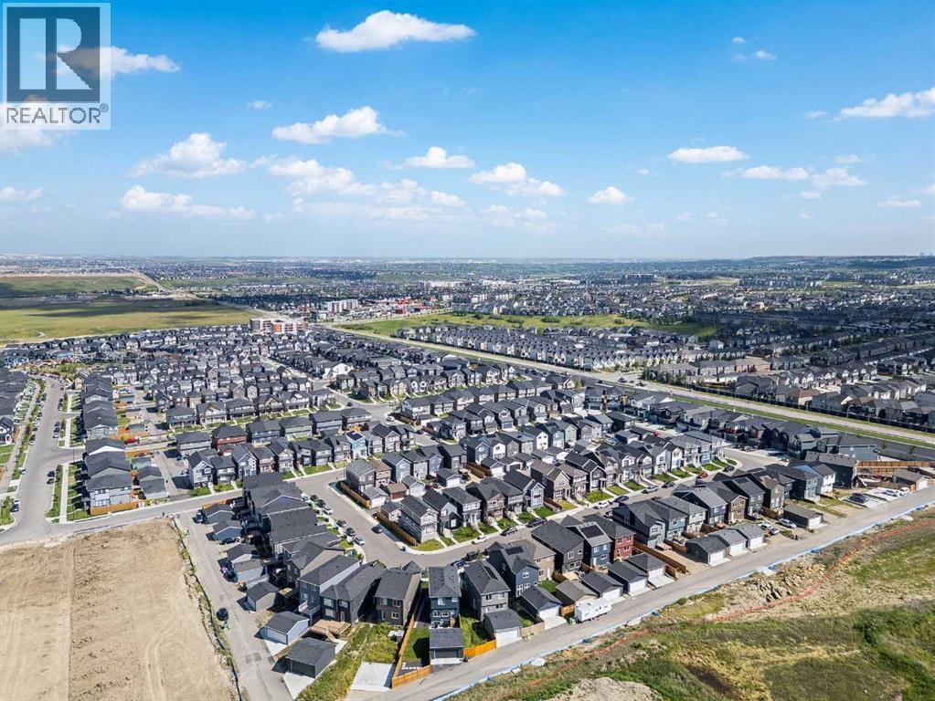 Single Family House 5 Level for Sale in  Aquila Way NW Glacier Ridge Calgary 