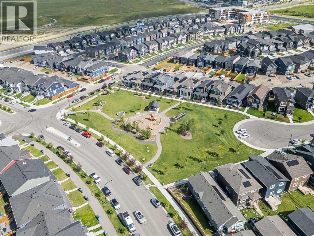 Single Family House 5 Level for Sale in  Aquila Way NW Glacier Ridge Calgary 