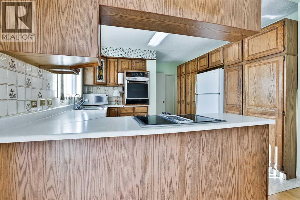 Single Family House Bungalow for Sale in  th Avenue S Victoria Park Lethbridge 