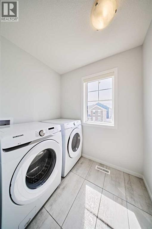 Single Family House for Sale in  Carringham Road NW Carrington Calgary 