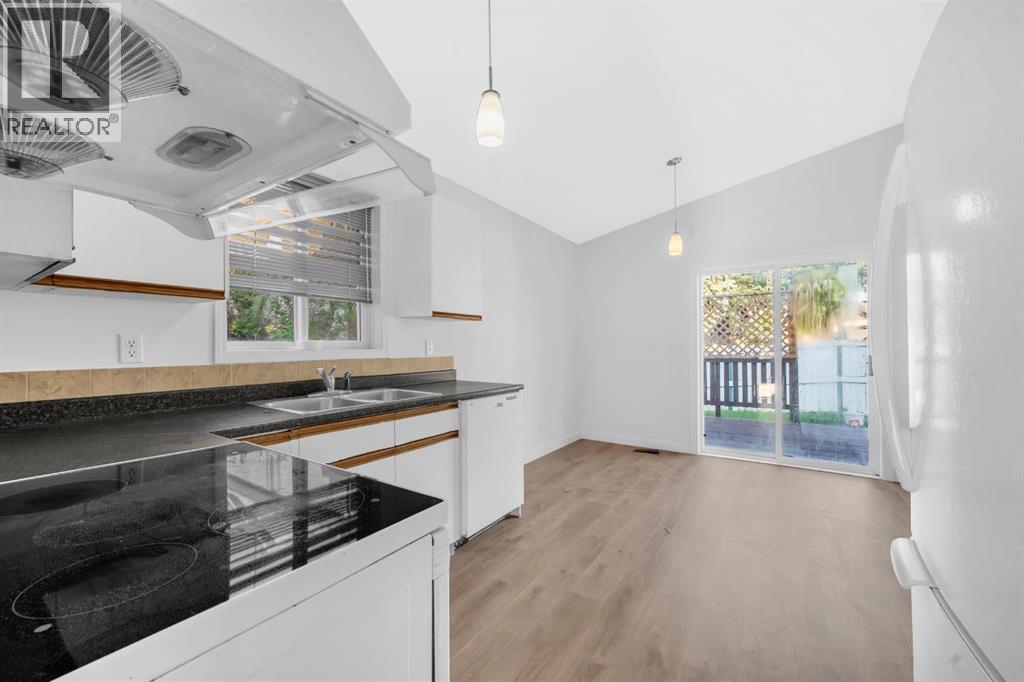 Single Family House 4 Level for Sale in  Shawbrooke Road SW Shawnessy Calgary 