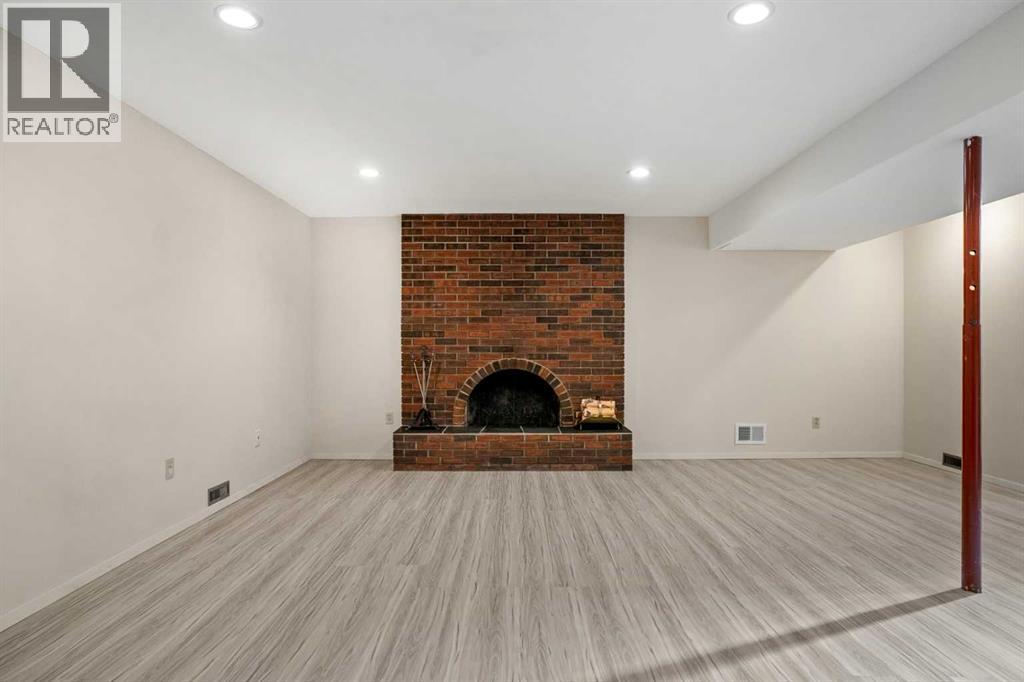 Single Family House Bungalow for Sale in  Lake Emerald Place SE Lake Bonavista Calgary 