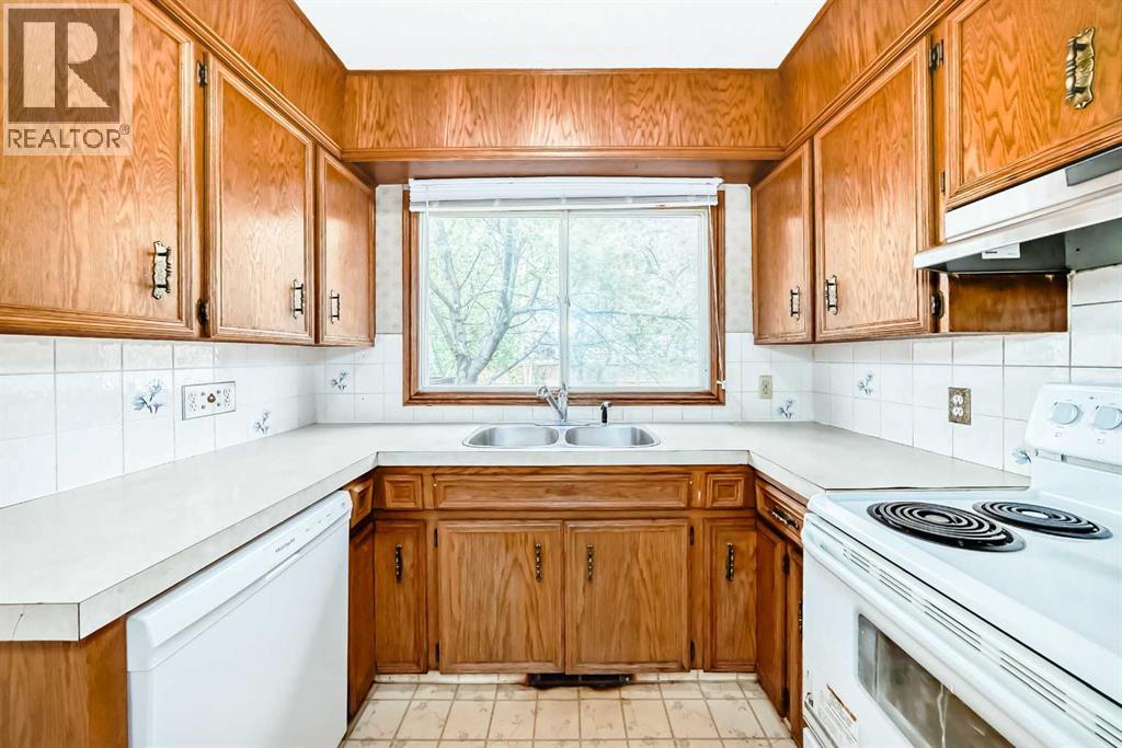 Single Family House Bi-level for Sale in  Barron Drive NW Brentwood Calgary 