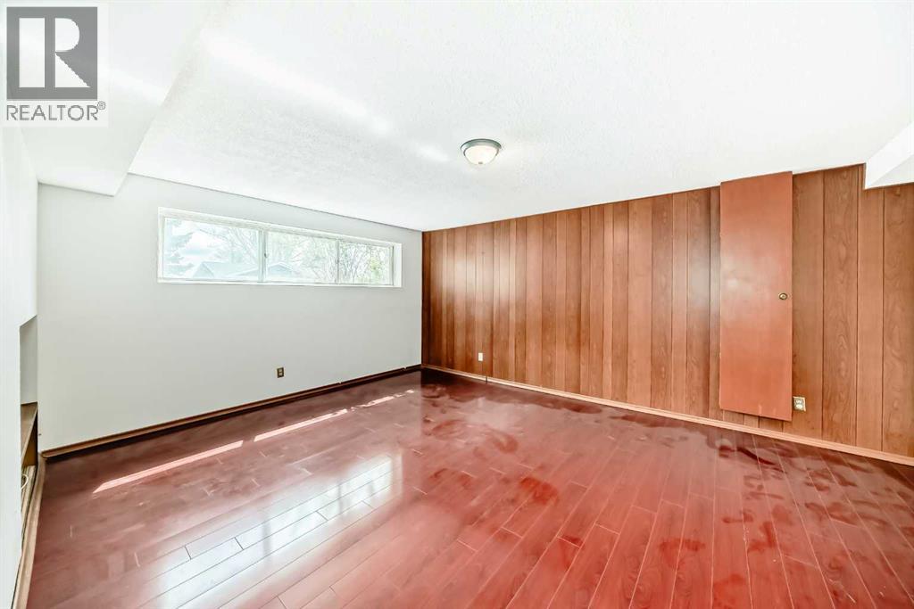 Single Family House Bi-level for Sale in  Barron Drive NW Brentwood Calgary 