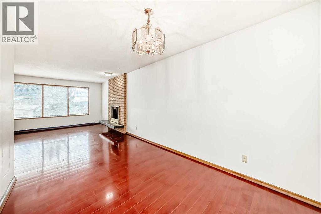 Single Family House Bi-level for Sale in  Barron Drive NW Brentwood Calgary 