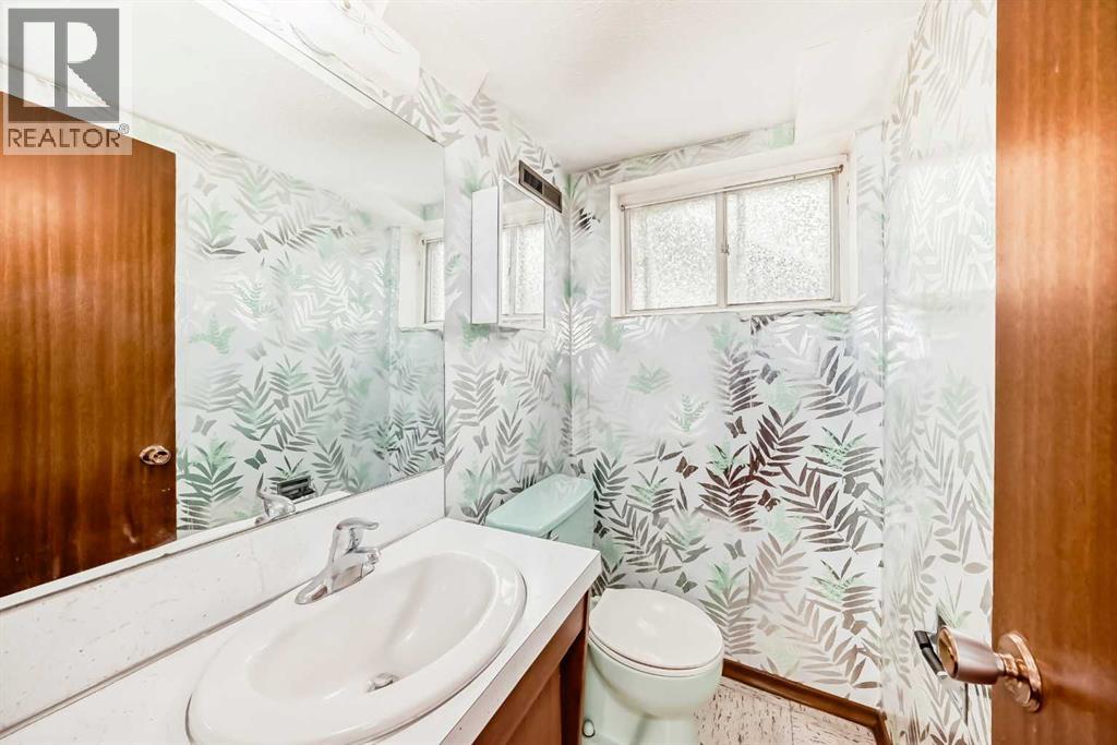 Single Family House Bi-level for Sale in  Barron Drive NW Brentwood Calgary 