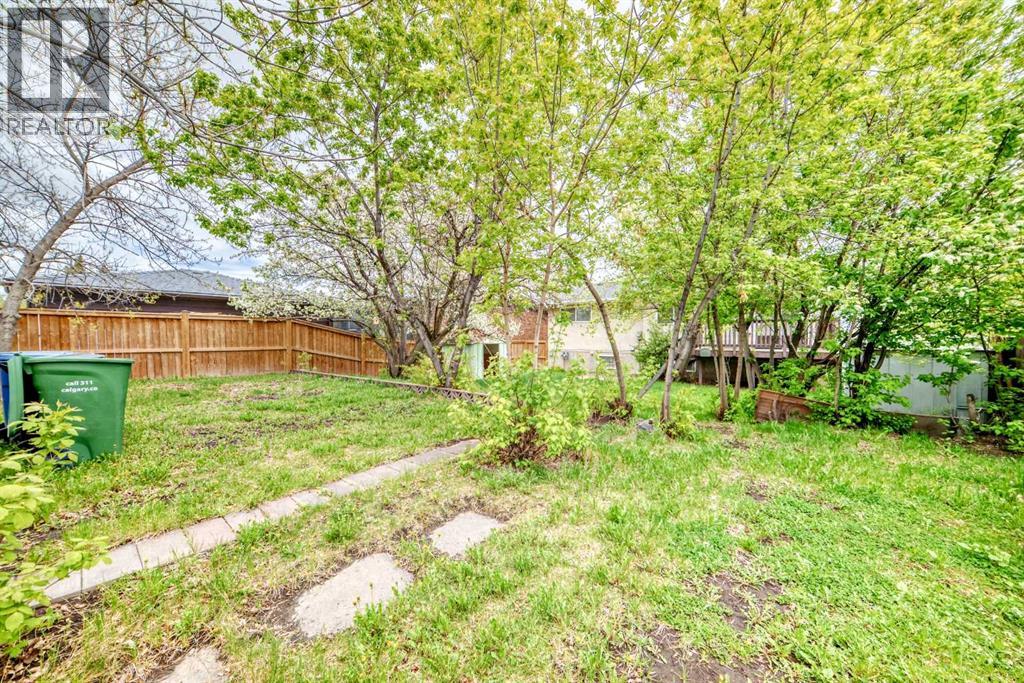 Single Family House Bi-level for Sale in  Barron Drive NW Brentwood Calgary 