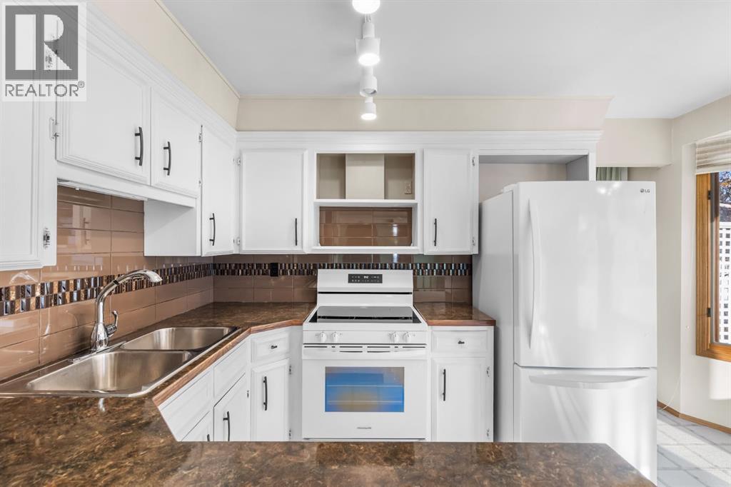 Single Family House 4 Level for Sale in  Breton Close NW Brentwood Calgary 