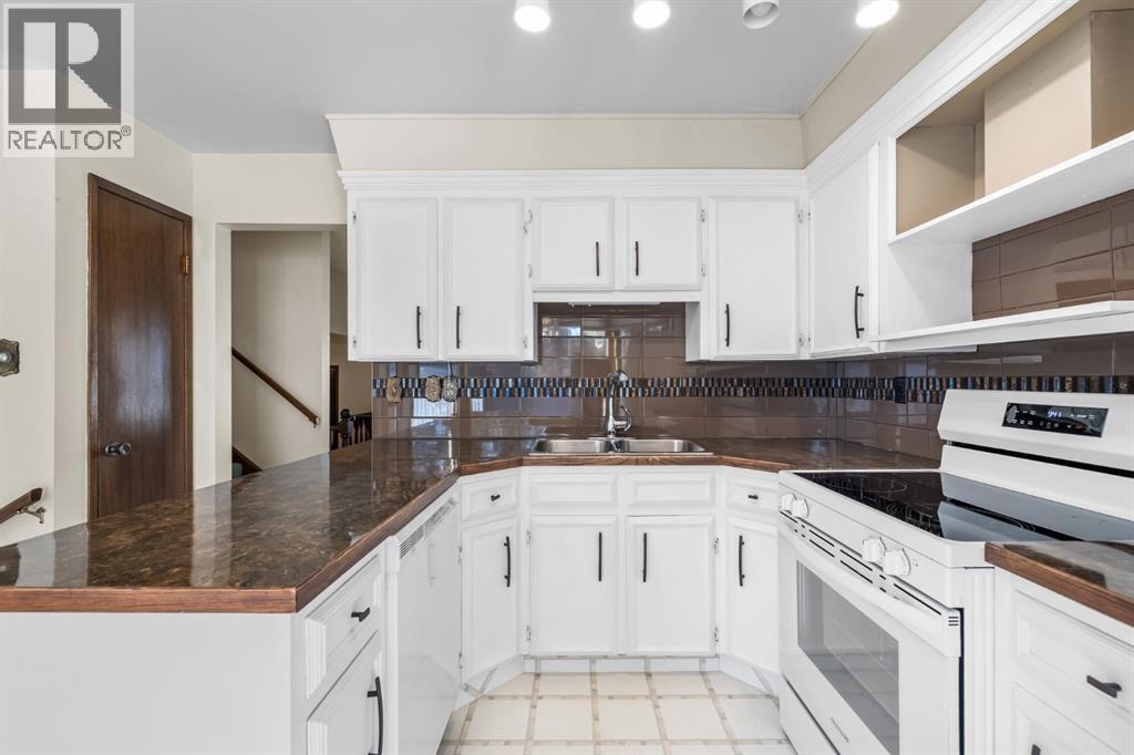 Single Family House 4 Level for Sale in  Breton Close NW Brentwood Calgary 