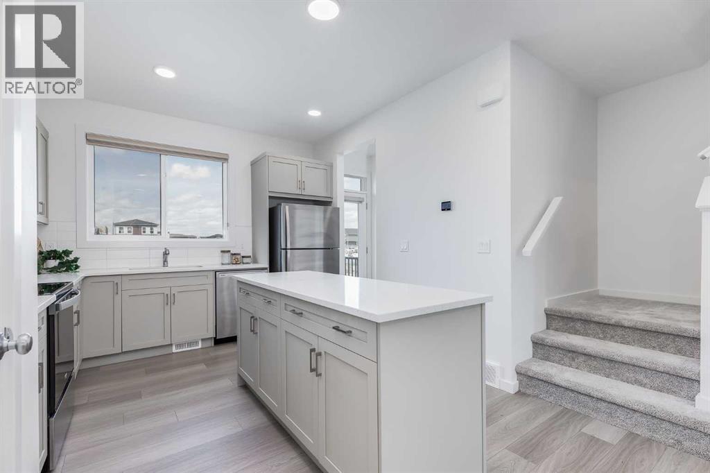 Single Family House for Sale in  Belmont Drive SW Belmont Calgary 