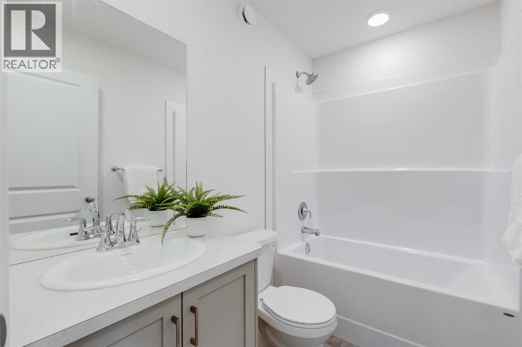 Single Family House for Sale in  Belmont Drive SW Belmont Calgary 